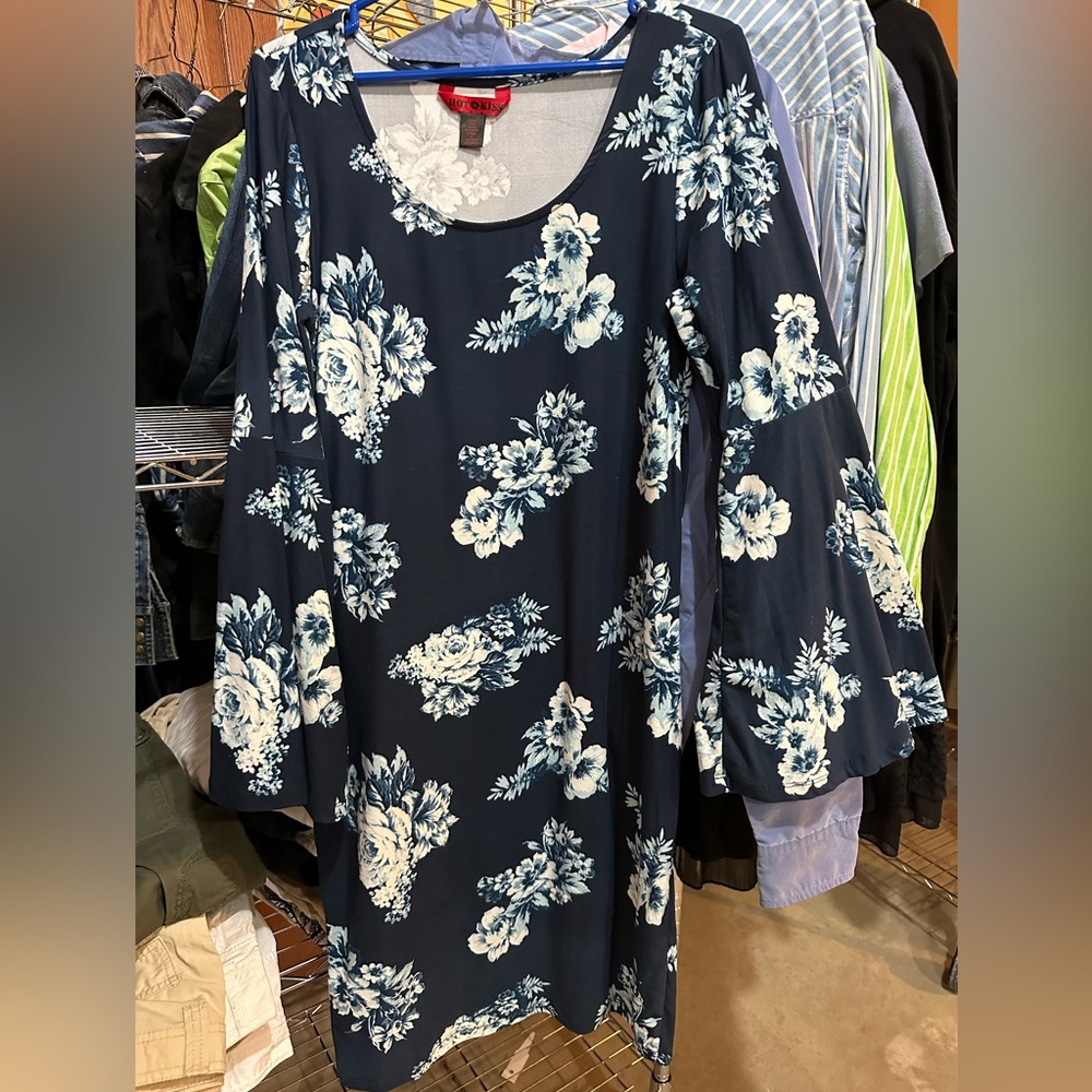 Beautiful floral dress with bell sleeves.